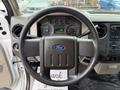 Interior view of a 2008 Ford F-250 SD showing the steering wheel dashboard and controls without any occupants or additional context