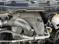 The image shows the engine of a 2019 RAM 1500 Classic featuring a HEMI logo with various interconnected components like hoses and tubes