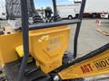 A 2024 AGT Mini Excavator showcasing its yellow body with the AGT Industrial logo prominently displayed on the side