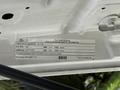 Label from a 2011 Ford F-350 SD vehicle emission control information with details about compliance and engine specifications