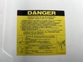 A warning label in French on a vehicle providing instructions and precautions for safely tilting the cab of a 2007 GMC W3500