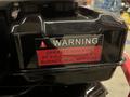 A warning label on a 2024 Magnum 4000 Hot Water Pressure Washer indicating to operate at full throttle or the burner will not fire