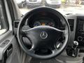 Steering wheel and dashboard of a 2016 Mercedes-Benz Sprinter with a speedometer and various controls visible