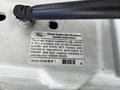 A label on a 2008 Ford F-550 detailing the diesel engine idle shutdown system information and compliance regulations for engine installations