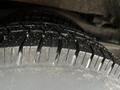 Close-up of a tire from a 2018 Chevrolet Express showing detailed tread pattern and texture