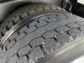 Close-up of two heavy-duty truck tires showing rugged tread pattern designed for optimal grip and durability