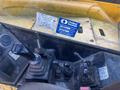 The image shows the control panel of a 2013 JCB 510-56 Loadall with multiple joystick controls and a rental sticker prominently displayed