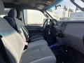 Interior of a 2015 Ford F-450 SD showing a gray seating arrangement with a dashboard and steering wheel visible
