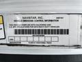 A vehicle emissions control information label for a 2019 International 4300 detailing compliance with California and U.S. EPA regulations for heavy-duty vehicles
