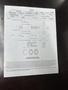 A service invoice for a 2015 Hino 195 detailing repairs and parts with itemized costs and totals