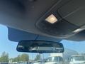 Interior view of a 2017 Ford F-150 showing the overhead console with lights and controls above the rearview mirror