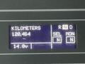 A digital display showing kilometers as 120464 and battery voltage as 14.0v with options for RND and MON