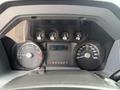Dashboard of a 2015 Ford F-350 SD displaying gauges for RPM speed fuel level and engine hours