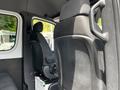 Interior view of a 2019 Mercedes-Benz Sprinter showing the driver's seat and passenger seat with a focus on the seating fabric and design