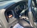 Interior view of a 2019 Dodge Charger showing the dashboard with gauges air vents and steering wheel