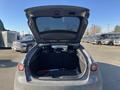 A 2023 Mazda MAZDA3 with the rear hatch open showcasing the spacious cargo area and seats folded down