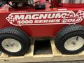 2024 Magnum 4000 Hot Water Pressure Washer with a red body large wheels and a prominent logo featuring the word MAGNUM and the text 4000 SERIES GOLD