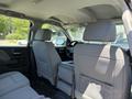 Interior view of a 2016 GMC Sierra 1500 showcasing the rear seating area with two headrests and a center console