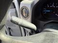 Close-up of the control stalk for turn signals and windshield wipers in a 2021 Ford Econoline dashboard