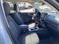 Interior view of a 2023 Ford Bronco Sport featuring fabric seats a steering wheel and a digital dashboard display