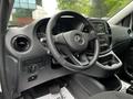 Interior view of a 2023 Mercedes-Benz Metris featuring a steering wheel center console and dashboard with controls and displays