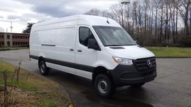 A 2024 Mercedes-Benz Sprinter 2500 van in white with a sleek design and a spacious cargo area