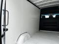 Interior of a 2012 Mercedes-Benz Sprinter van showing a spacious cargo area with a blank wall and a flat floor