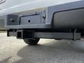 A 2010 Ford Ranger showing the rear bumper and towing hitch attachment