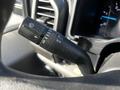 Close-up of the control stalk on a 2018 Ford F-550 featuring wiper and headlight controls