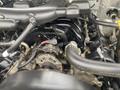Close-up view of the engine compartment of a 2017 Ford F-550 showing various engine components and hoses.