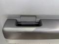 Close-up of a textured door handle on a 2011 Ford F-350 SD