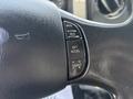 Close-up of the steering wheel controls of a 2015 Ford F-750 featuring buttons for resume, set, accelerate, and coast functions