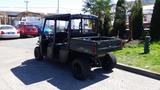 A black 2016 Polaris Ranger 570 Crew side-by-side vehicle with rear cargo bed and seating for multiple passengers