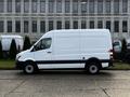 A white 2017 Mercedes-Benz Sprinter van with a simple design and black trim visible from the side