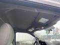 Interior view of a 2017 Ford F-250 SD showing the roof liner and overhead console with lights and controls