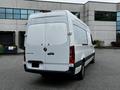 A 2019 Mercedes-Benz Sprinter van viewed from the rear with a white exterior and a sleek design