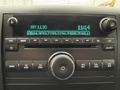 Dashboard of a 2013 Chevrolet Silverado 3500HD featuring a radio display with tuning options and a central control knob