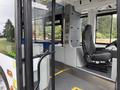 Interior view of a 2018 Grande West Vicinity bus showcasing the driver's seat and control panel