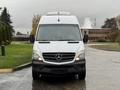 A white 2016 Mercedes-Benz Sprinter van facing forward with a prominent front grille and the Mercedes logo on the hood