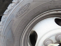 Close-up of a tire on a 2020 Chevrolet Express showcasing the tread pattern and sidewall details including the size and specifications