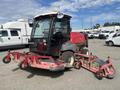 A 2014 Toro Groundmaster 5910 with a cab and three rotary mower decks attached in the front and a wide cutting width for efficient lawn maintenance