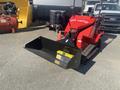 A red 2025 AGT Industrial SDA-140TZ compact tractor with a large black attachment at the front designed for moving materials
