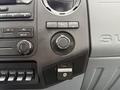 Interior dashboard of a 2015 Ford F-350 SD showing controls for air conditioning and an audio system along with a USB port and power outlet