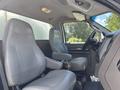 Interior of a 2016 Ford F-750 showing two gray seats and the dashboard