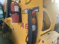 A yellow 2013 JCB 510-56 Loadall with visible controls a fire extinguisher mounted on the side and taillights on the rear section