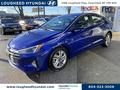 A blue 2020 Hyundai Elantra parked in a lot showcasing its sleek design and modern features