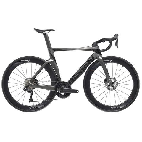 A 2024 Bianchi Oltre Comp Ultegra Di2 road bike featuring a sleek black frame aerodynamic design and disc brakes