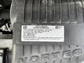 A 2017 Chevrolet Express engine component showing the vehicle emission control information label