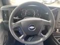 Interior view of a 2018 Chevrolet Express van focusing on the steering wheel dashboard and control panel