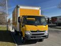 A yellow 2017 Hino 155 box truck facing forward with a white cargo area and a distinctive front grille design